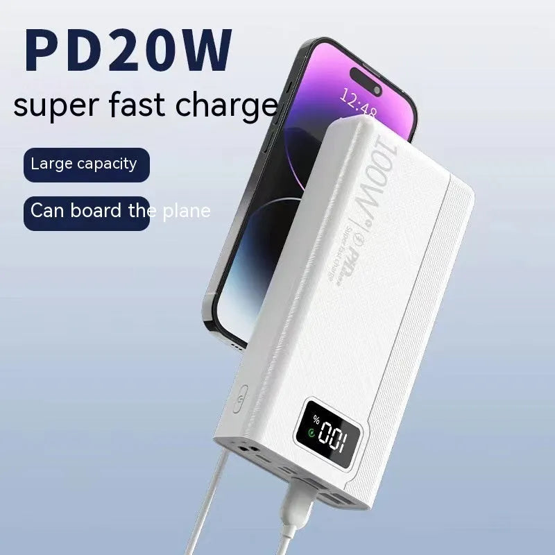 Large capacity power bank in black or white plastic casing showing front panel with charging ports