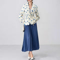 Women's printed polyester jacket with a lace-up collar detail, shown in a floral design.