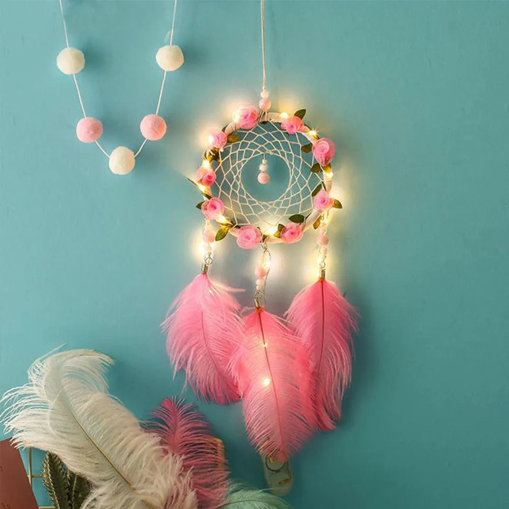 Pink ostrich feather dreamcatcher wall decoration ornament measuring 10cm.