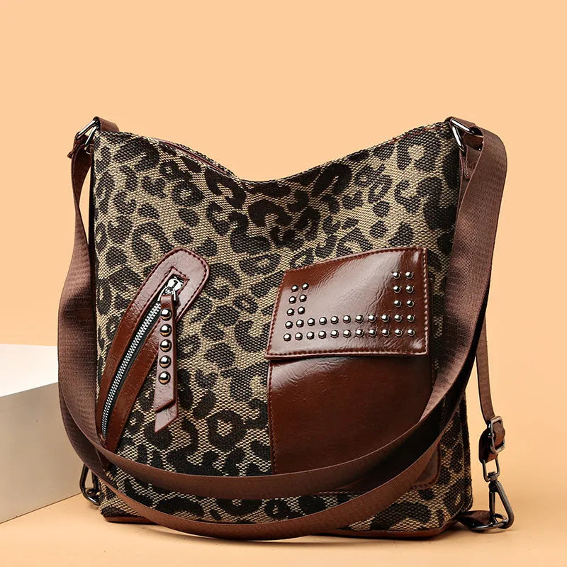 Medium houndstooth nylon backpack for women with rivet design and zipper opening in Leopard Pattern