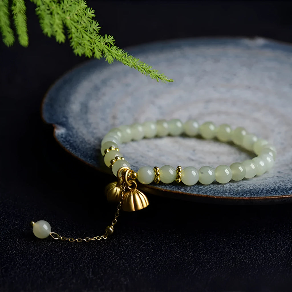 Natural Hetian Jade bracelet with lotus design and sunny water patterns