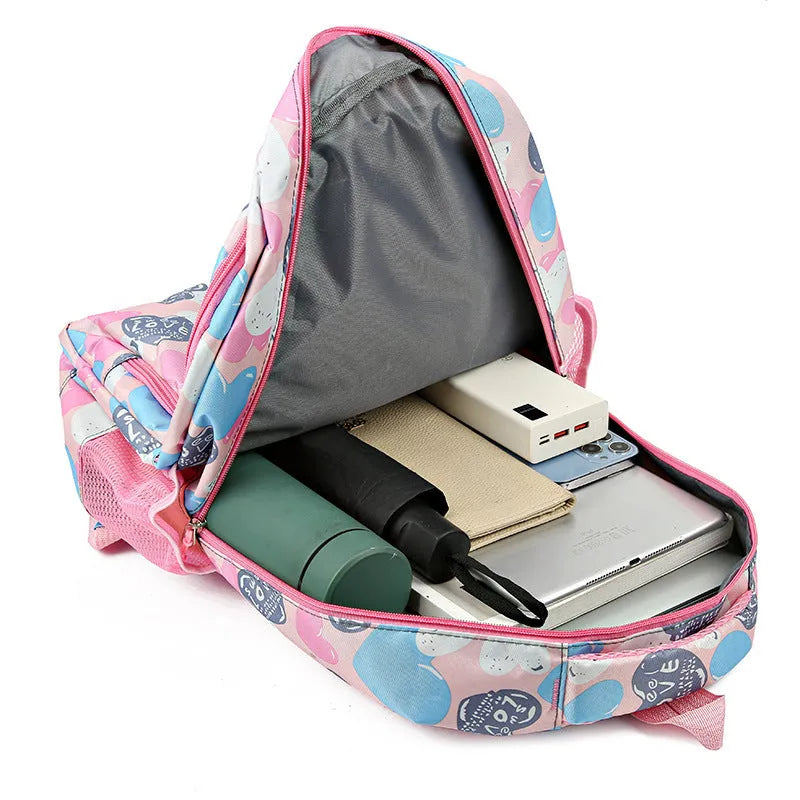 Blue children's large capacity Oxford cloth school backpack with air pillow straps.