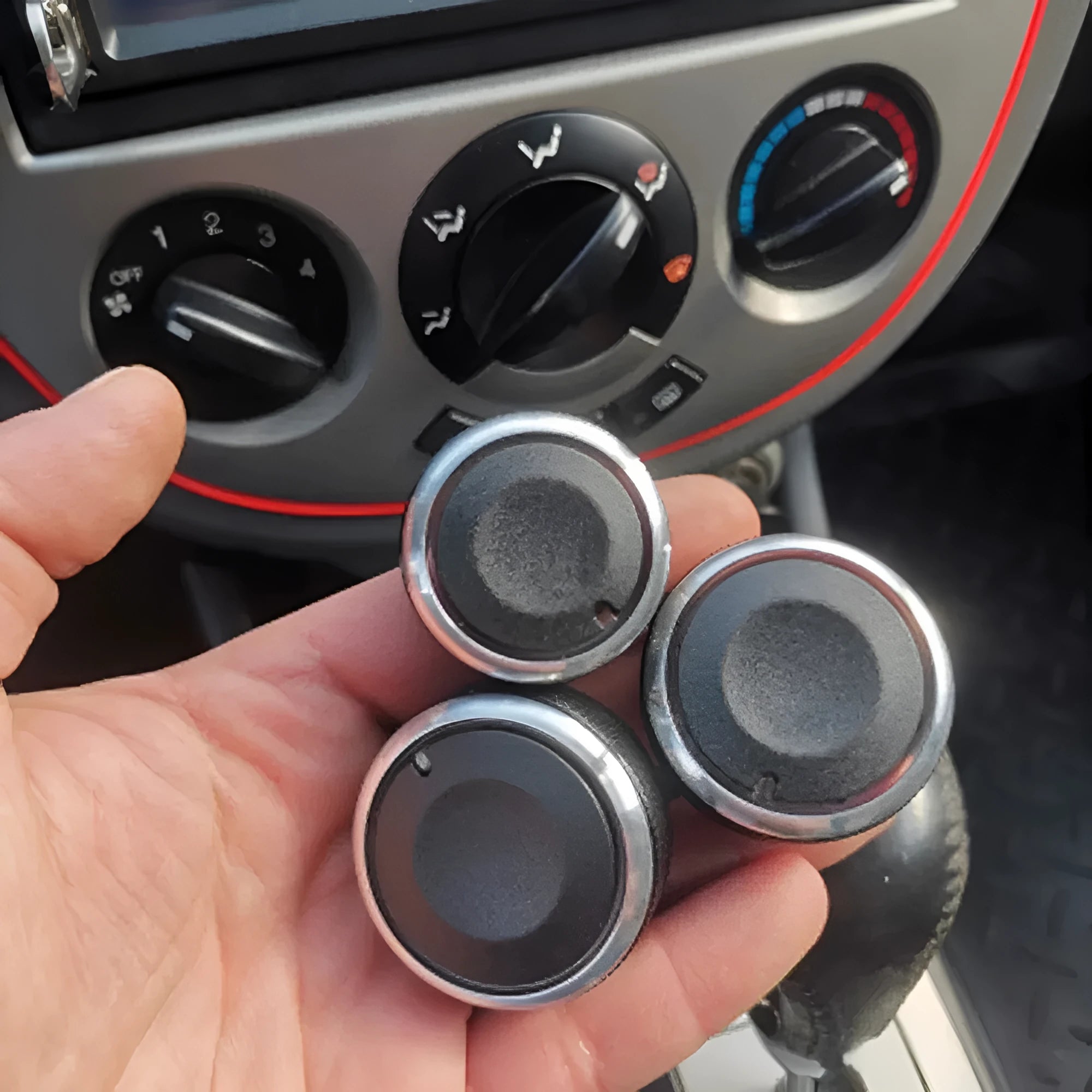 Three black aluminium air conditioning knobs for Chevrolet Lefeng and Lechi cars