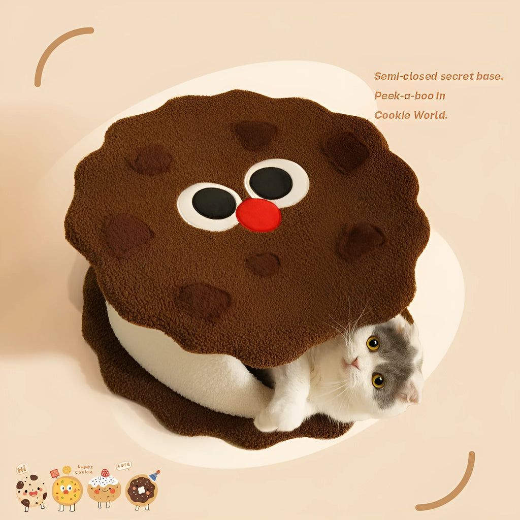 Khaki-coloured enclosed cat nest bed shaped like a sandwich cookie with a high entry wall.