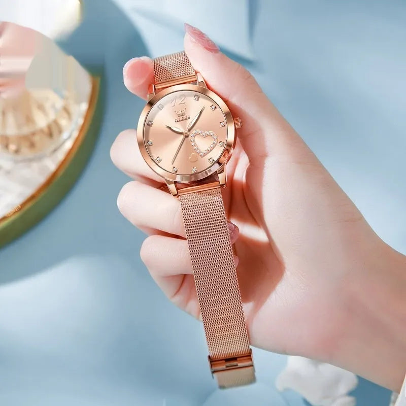 Fashion women's watch with a mesh strap and rose alloy case, showing colour dial options.