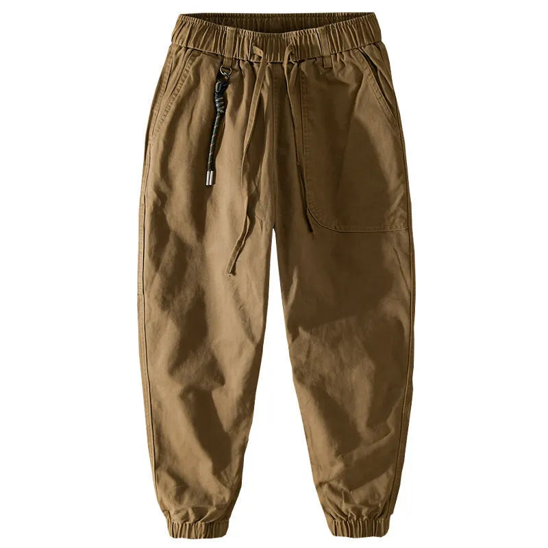 Man wearing Amekaji-style casual overalls with ankle banding in Army Green colour.