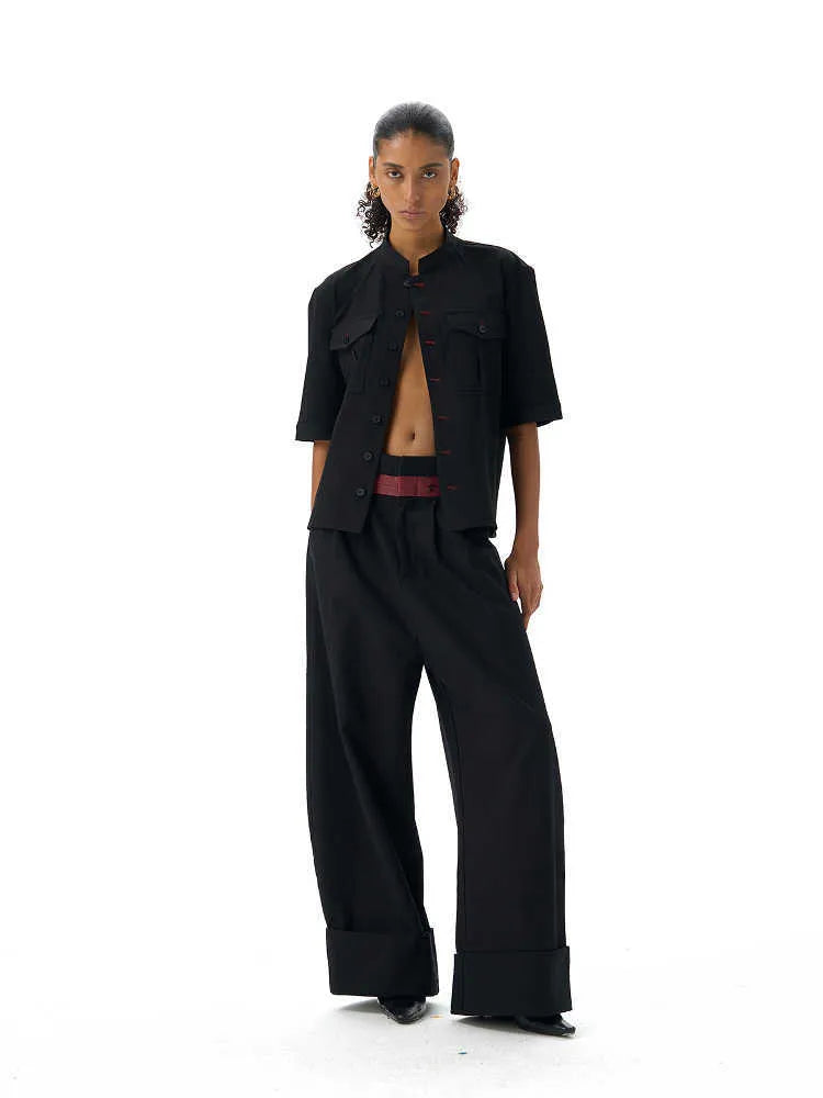 Handmade black half sleeve men's shirt with a shirt collar and loose fit for casual hunting wear.