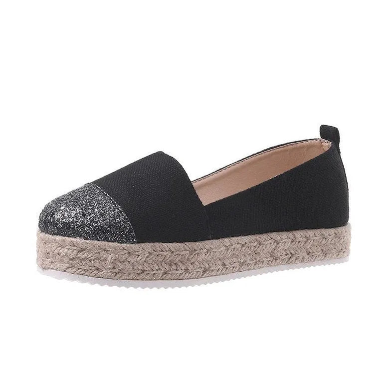 Plus size breathable canvas flat shoes in black with round toe and slip-on design