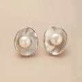 Sterling silver needle earrings with geometric design and pearl accents in gold electroplated finish