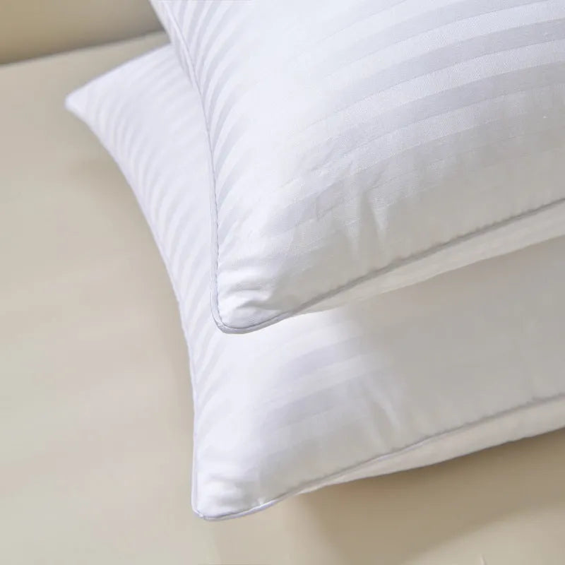 White cotton pillow with a thin satin stripe, showing feather cotton filler and three size options.