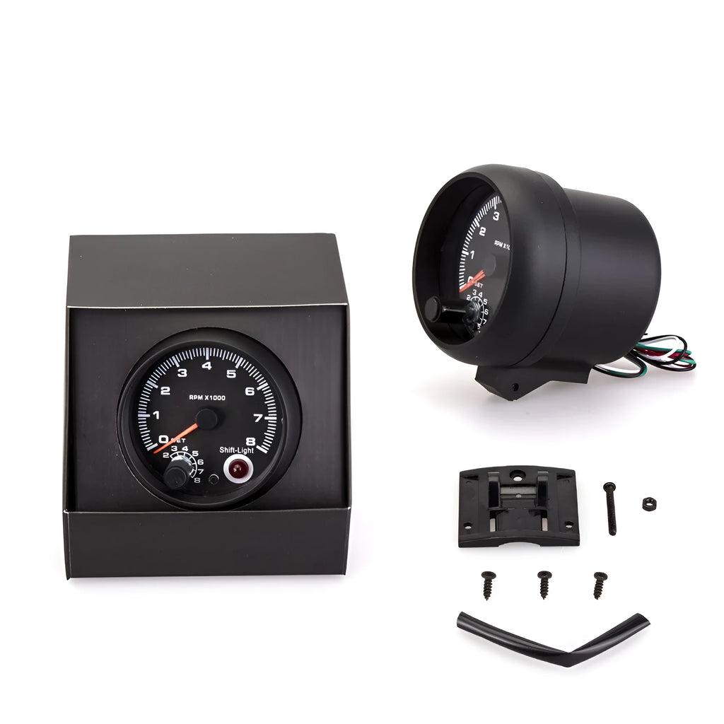 Black automotive tachometer with blue light pointer display for RPM measurement