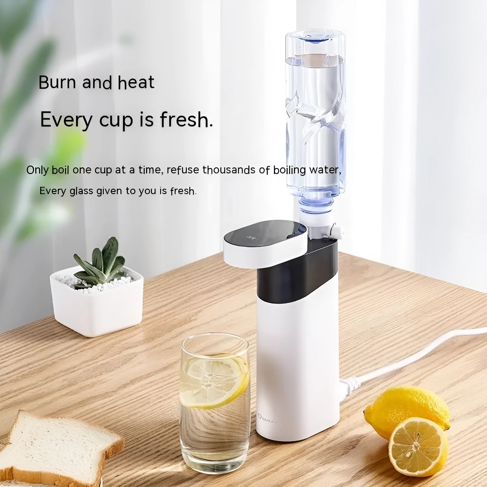 Small black or green desktop instant water dispenser with digital display.