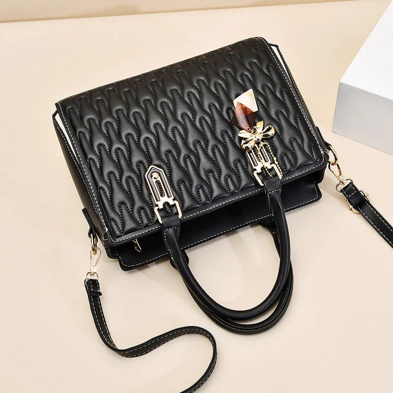 Women's large-capacity polyester messenger bag in black, showing outer pocket design.