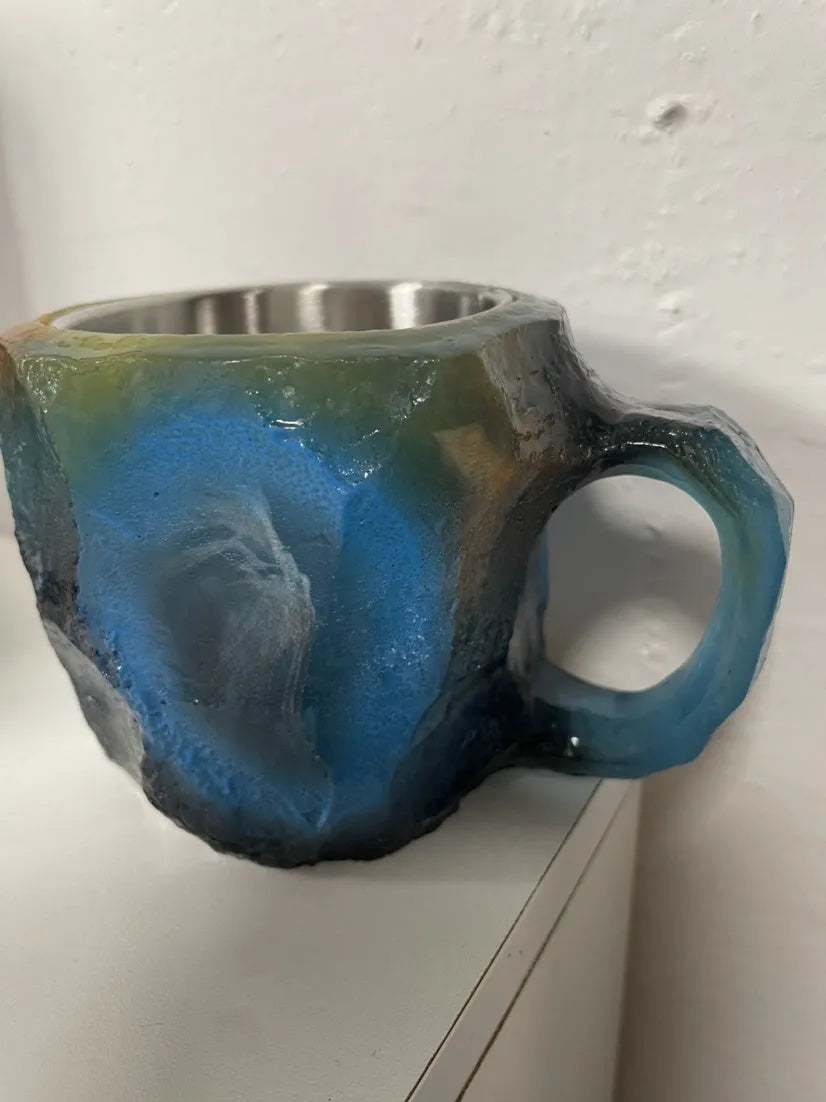 A 400ml resin coffee mug with a crystal-like textured design and a handle, shown in a purple colour.