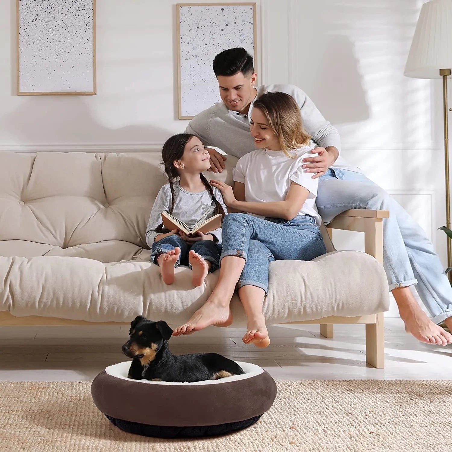 Circular grey cloth pet bed with raised sides for a cat or small dog