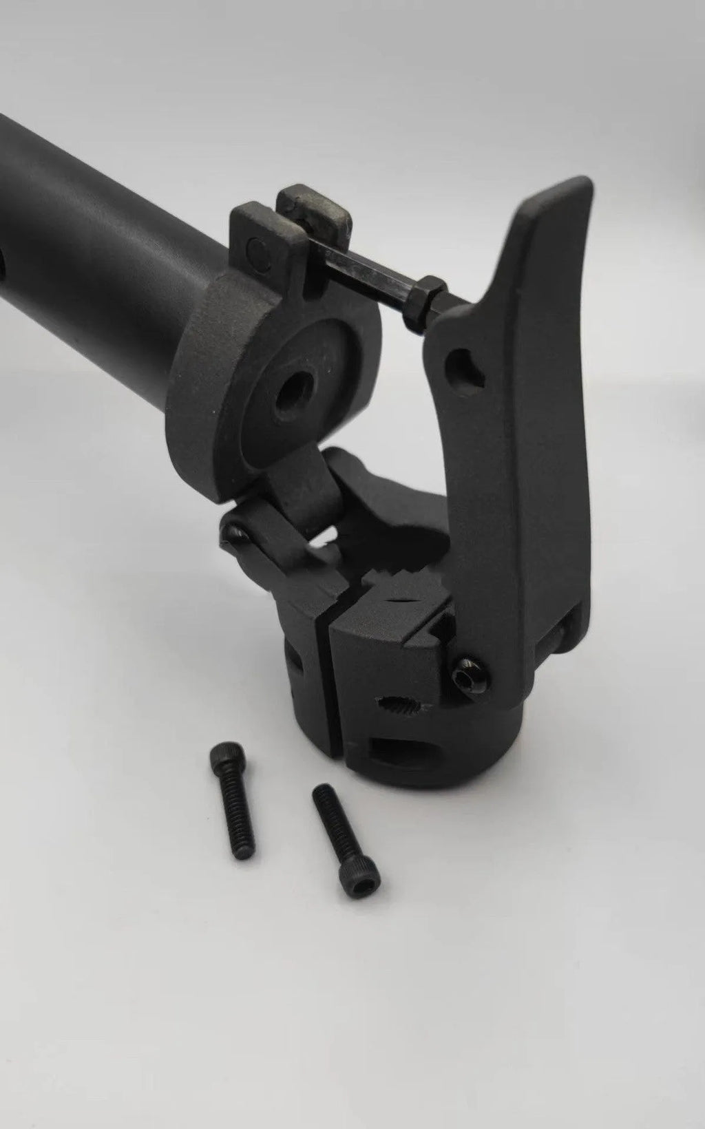 Black folding upright handlebar accessory for Nanbo No. 9 scooter, shown next to a scooter deck.