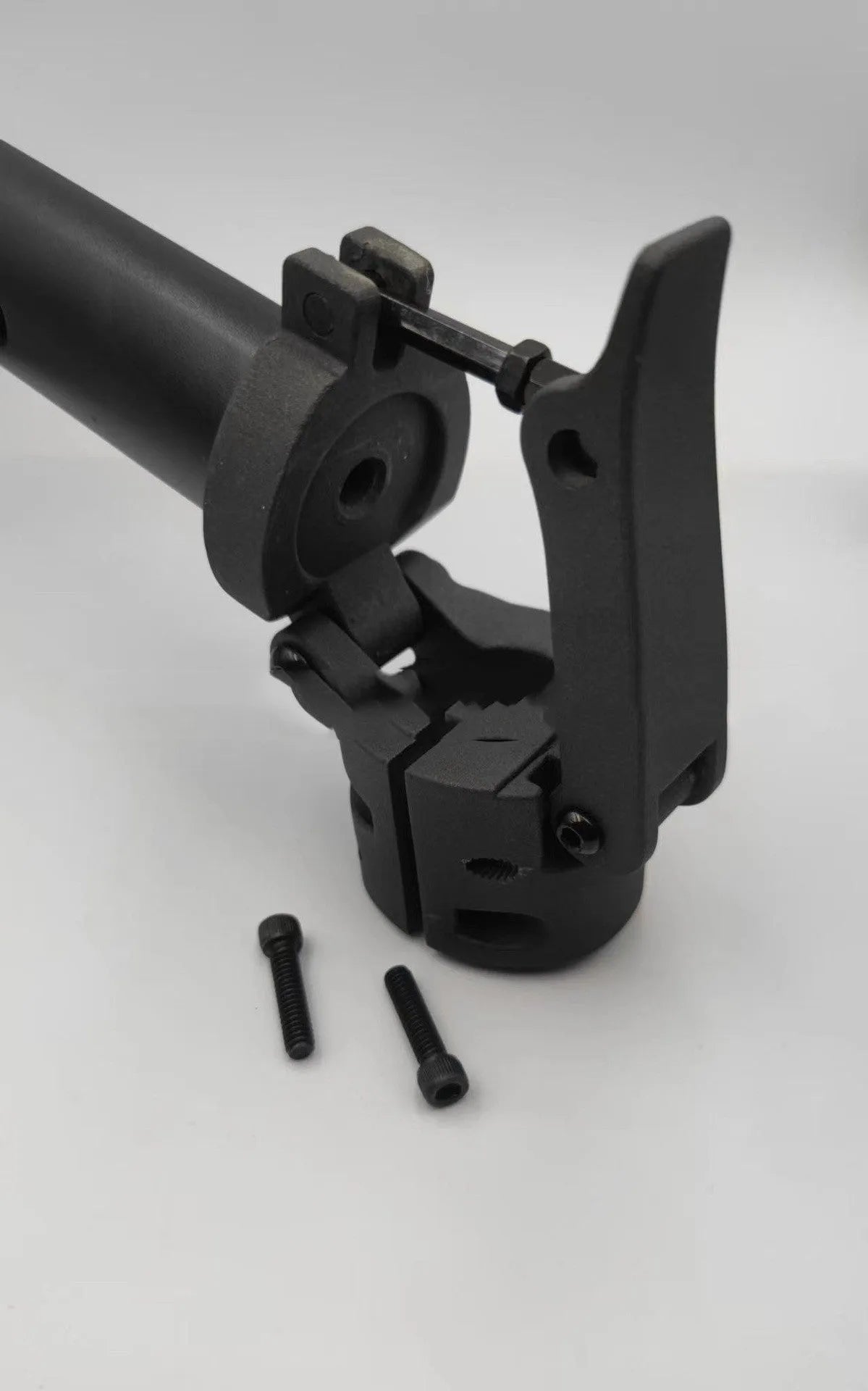Black folding upright handlebar accessory for Nanbo No. 9 scooter, shown next to a scooter deck.