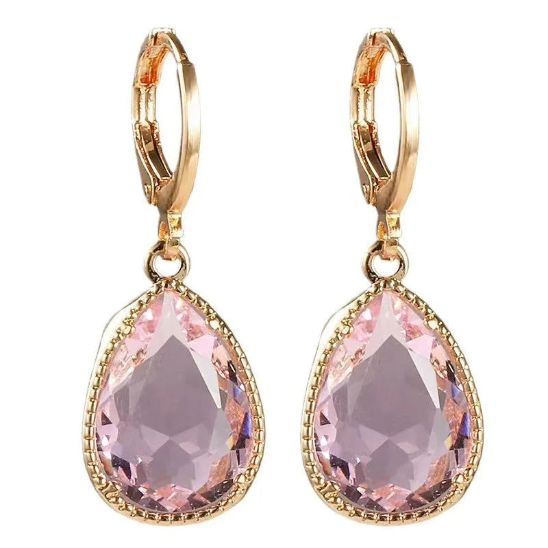Copper-coloured rare earth metal and glass geometric saturn water drop earrings in multiple colours.