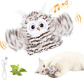 Grey automatic chirping owl cat toy with flapping wings on flat surface