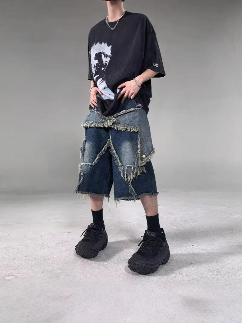 Blue retro denim shorts with frayed five-pointed star detail and loose fit design